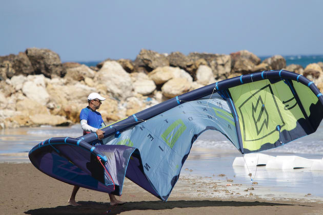 kiteboarding-man-holding-inline.jpg